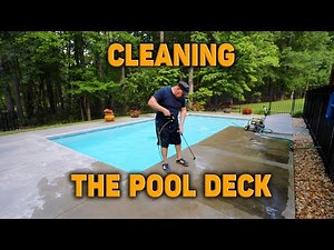 CLEANING THE POOL DECK.