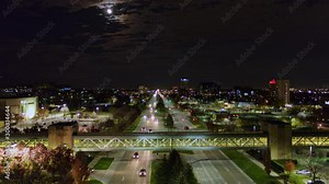 Detroit Michigan Aerial v183 Fly over of Beaver road looking toward downtown skyline with plane take off and moon sky - October 2017