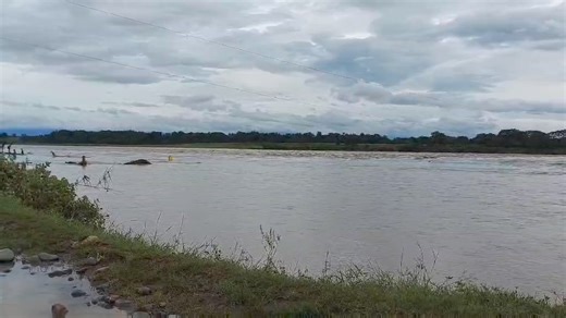 Residents of Brgy. Gucab in Echague, Isabela, gather at the La Paz overflow bridge to watch the waters recede on October 24, 2024, a day after tropical storm #KristinePH made landfall in the area. According to Isabela's local government, #KristinePH and the release of water from Magat Dam raised water levels, rendering several overflow bridges impassable. | via Jonathan Cellona, ABS-CBN News | ABS-CBN News
