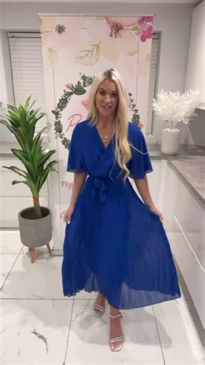 #fashiontiktok#fyp#occasionwear#affordablefashion Shop our “alira” occasionwear dress perfect for communions/confirmations/weddings 💙 www.poppylaneclothing.ie 🔗 https://poppylaneclothing.ie/products/alira-wrap-dress?variant=56667628274039