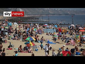 Thousands flock to beaches on UK's hottest day despite COVID-19 warnings