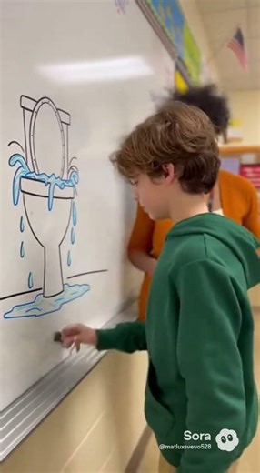 The kid is drawing a toilet on a school's whiteboard and he gets scolded by the teacher.