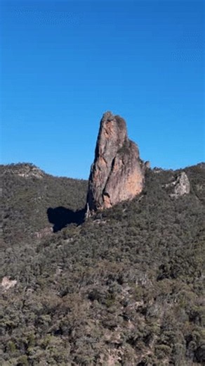 clip-4142871371-panning-shot-breadknife-rock-formation-volcanic-peaks