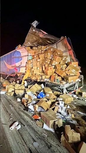 Amazon packages spill onto a highway after a crash