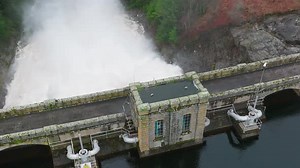 Water Pumped Through a Gravity Fed Hydroelectric Power Station Dam Slow Motion