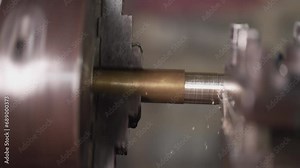 close up of machine operation for Metal Lathes. The steel column rolling in machine. metalworking industry. finishing metal working internal steel surface on lathe grinder machine with flying sparks