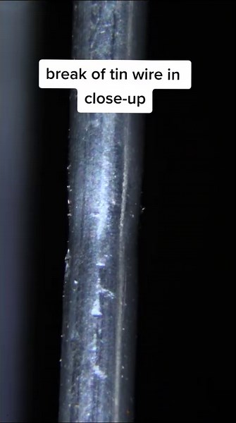 Tin Wire Breaking in Detailed Close-Up