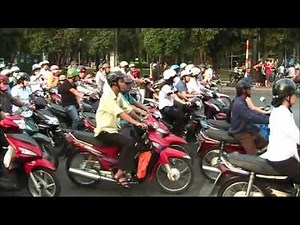Crazy Street Traffic in Saigon (Ho Chi Minh City), Vietnam (Scooters EVERYWHERE!)