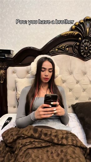 Sibling Interaction: A Playful Bedroom Scene