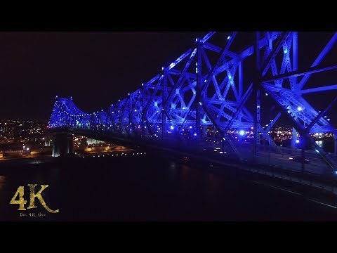 Montréal: Pont Jacques Cartier la nuit en drone / Night aerial view of illuminated bridge