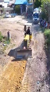 Construction Worker Skills With Bulldozer Operator Pushing Soil Into Low Land #dozer #bulldozer #construction #heavyequipment #operator | Arpunk