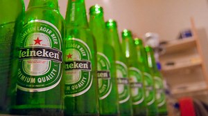 A Christmas tree created with a bottle of beer