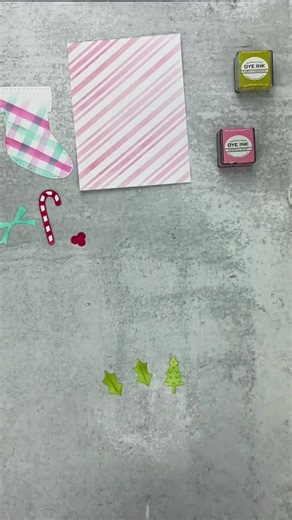 Crafting with the Build-A-Stocking Die feels like decorating for Christmas in miniature 🎄🧦. Choosing the patterns, tucking in candy canes, and adding little details makes every stocking one-of-a-kind ✨. 👉 Watch the video and tell me, what would you tuck inside your paper stocking? 🎁👇 #papertreyink #handmadeholidays #papercraftvideo #cardmakersofinstagram | Papertrey Ink