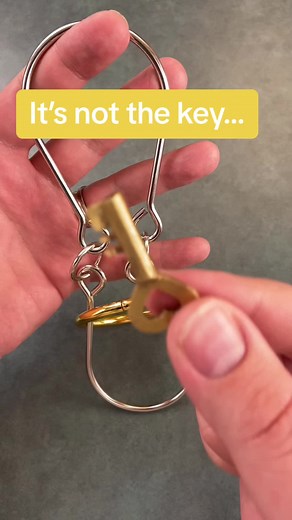 Unlocking Handcuffs: The Ring Puzzle Solution
