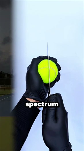 why tennis balls are always yellow?