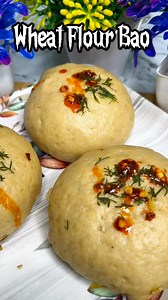 Wheat Flour Bao 🔥🔥. Bao is usually made from maida (all-purpose flour), but today we will make it from wheat flour.Bao is a type of bread, but it is cooked by steaming, not on a griddle.It is very soft and light. You can fill it with anything you like, such as meat, vegetables, or sweet paste.In China, bao is widely sold on the streets; it is a very old and traditional food of China.Ingredients * Wheat flour 200 grams * Sugar 1 tsp * Instant dry yeast 1/3 tsp * Oil 2 tsp * Lukewarm water * Sal