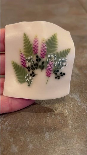 Polymer clay cane slices on a sheet of Premo white translucent. #polymerclay