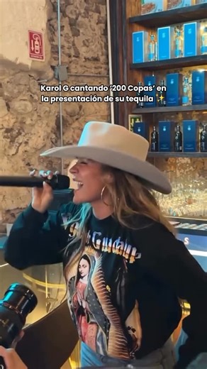 KAROL G on Instagram: "Karol G cantando ‘200 Copas’ en la presentación de su tequila ✨"