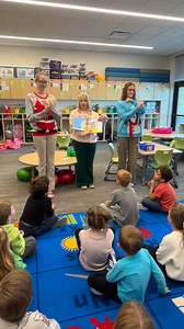 The ASL ll students from FMHS read a book and taught signs to our primary students. | Monument Ridge Elementary School