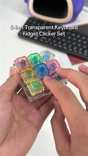 This 5-style keyboard fidget clicker set lets you mix, match, and click with satisfying crisp sounds for stress relief.\t#minikeyboard #keyboardfidget #keyboardkeychain #asmr #giftforcoworker
