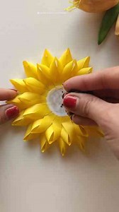 Create a beautiful paper sunflower that will brighten any room