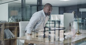 Office, desk and businessman walking to start working and reading with glasses on computer. Beginning, job and mature black man or entrepreneur in morning at company workplace with determination