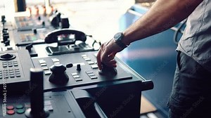 dynamic positioning officer operationg bridge ship equipment of offshore dp vessel thruster pitch propellers and joystick system