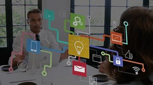 Animation of connected icons forming flowchart over diverse coworkers discussing reports in office. Digital composite, multiple exposure, ideas, social media, teamwork, communication and technology.