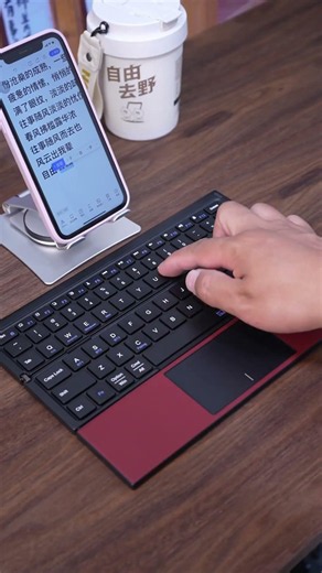 A foldable keyboard compatible with both phones and tablets! It also includes a touchpad.
