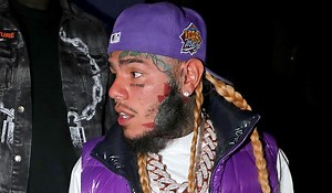 6ix9ine's Girlfriend Grooms His Face On Instagram Live