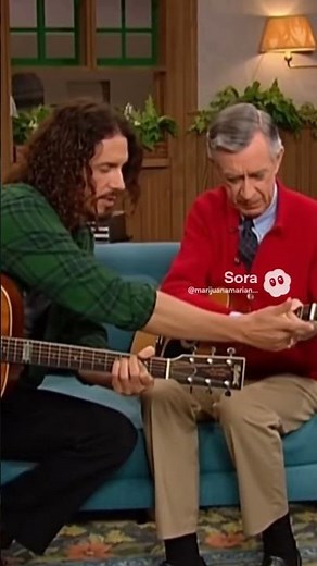 Chris Cornell teaches Fred Rogers how to play guitar