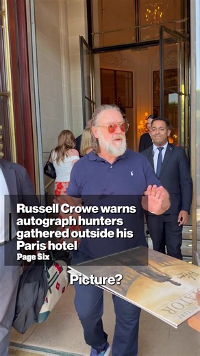 Russell Crowe Warns Autograph Hunters in Paris