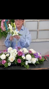 4.5K views · 208 reactions | This past week, we created a long, low centerpiece in shades of white and purple, and I’m excited to share a little peek at the process! Watch this quick video to see how it all came together — and click the link below to watch the full tutorial ⬇️ https://m.youtube.com/watch?v=Ti6gtfQsKMk | Flowers by the Bunch | Facebook