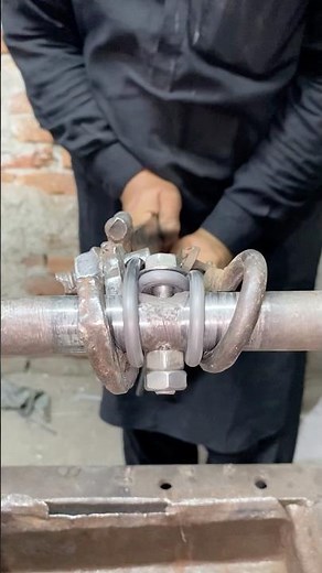 Master Craftsman Turning Single Wire into a Perfect Spring