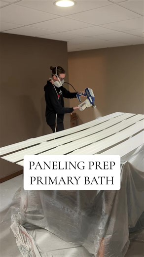 Prepping to panel our tub surround. We picked up PVC beadboard panels and trim, sprayed them, cut them to size, and removed some of the wall tile at the door transition. #romantub #bathtub #bathroom