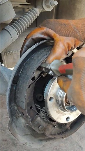 Installing the brake shoe spring