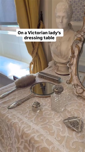What are these intriguing tools on Mary Anne Disraeli's dressing table? 📍 See them and other Victorian curiosities at Hughenden in Buckinghamshire. Video Description: Over images of an old-fashioned dressing table with silver tools on it, buttoned Victorian boots, Victorian ladies and a yellow and blue bedroom, text overlay says: On a Victorian lady's dressing table you might find these silver trinkets, but what are these? Clue: The Victorians put teeny-tiny buttons on everything, from gloves t