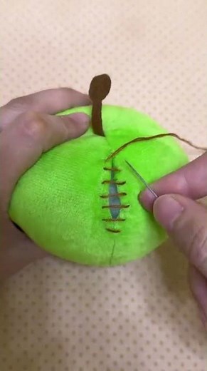 the process of sewing fabric filled with dacron to form an object