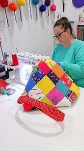 Let's sew a Chubby Chamber bag for my daughter's teacher! 🍎 Charm Pack: Colors of Kindness Charm Pack 5" Stacker Bundle - Riley Blake Designs Pattern: Chubby Charmer Bag https://shop.twochicksquilting.com/shop/c/p/Chubby-Charmer-Bag-Pattern-x75828990.htm #sewing #teacherappreciation #quilting | Uniquely Mateo