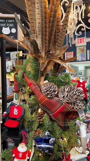 Our men’s Christmas tree is fully loaded. 🔥 Sports, hobbies, hunting, fishing — if he’s into it, it’s on this tree! Come and find an ornament he’ll be excited about decking the halls with! 🎄⚽️🎣⛳️ | Bella Chic Home and Gift Boutique