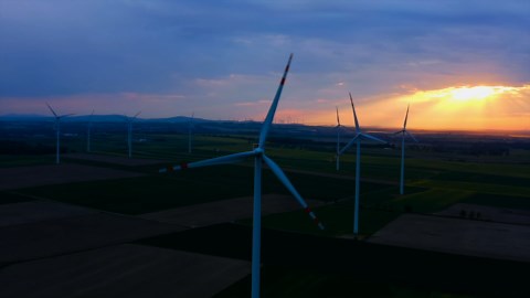 Snow covered peaks rising across a vast alpine landscape