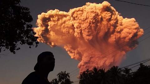 Indonesia volcano spews colossal ash tower, alert level raised