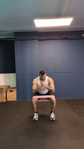 Banded Squat knee kick outs