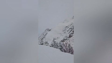 Avalanche crashes down snow-covered hillside in India