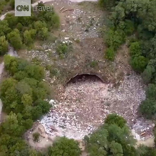 Watch as millions of bats fly out from under a bridge in Austin, Texas | CNN