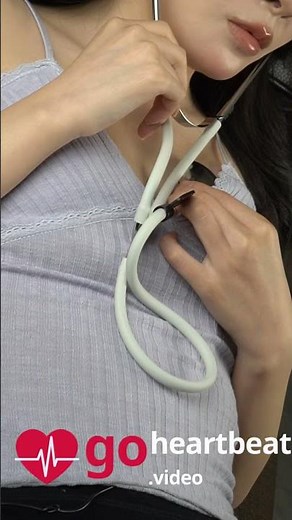 Listening to Her Own Heartbeat w/ a Stethoscope