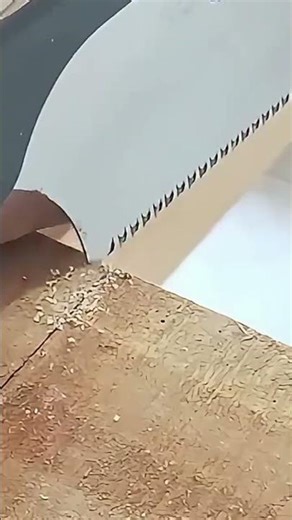 drawing a line on a piece of wood to make the dimensions to which other wood will be attached