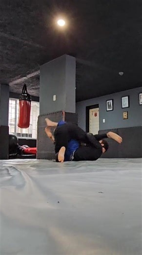 Armbar threat to sweep to armbar