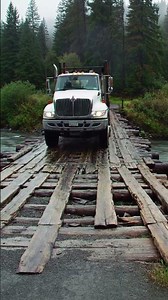 “Terrifying Moment: Overloaded Truck Tips Over on a Wooden Bridge”
