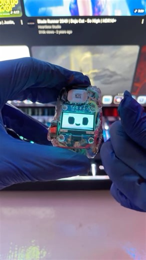 CanabeezDiyz on Instagram: "Can Program Anything. They said you can’t fit a computer inside a closed fist. This isn’t a toy. It’s currently installed with this toy software. It’s a fully functional, open-source modular development kit compacted into a mini package fits in a fist easily Despite the raw, skeleton look, it’s packing serious power: 🧠 Brain: ESP32-C3 Super Mini 🖥️ Display: SSD1306 i2s OLED Display 🔊 Voice: I2S Hi-Res Audio (DAC) 👆 Interface: 2 Capacitive Touch Sensors (No buttons